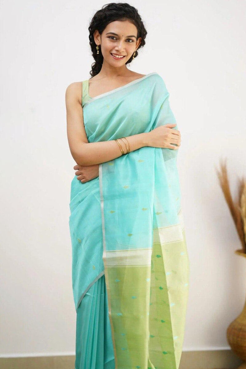 Mellifluous Sea Green Cotton Silk Saree With Staggering Blouse Piece