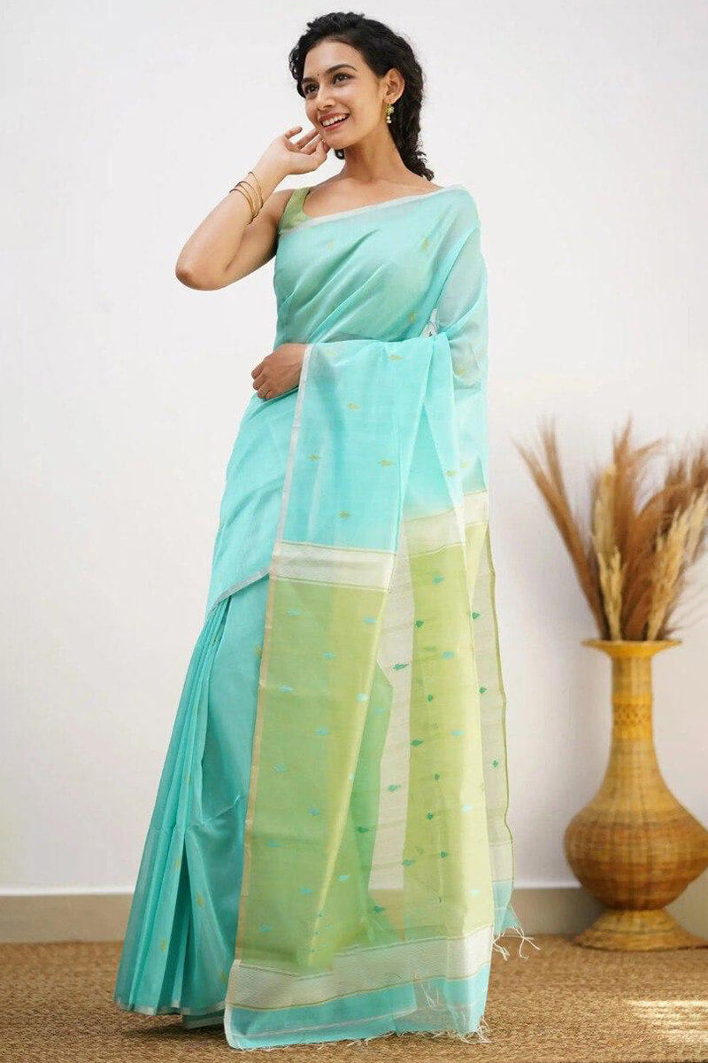 Mellifluous Sea Green Cotton Silk Saree With Staggering Blouse Piece