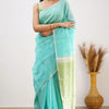 Mellifluous Sea Green Cotton Silk Saree With Staggering Blouse Piece