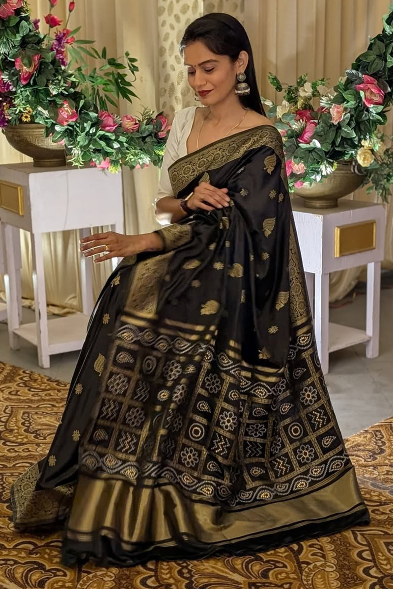 Prettiest Black Soft Silk Saree With Tantalizing Blouse Piece