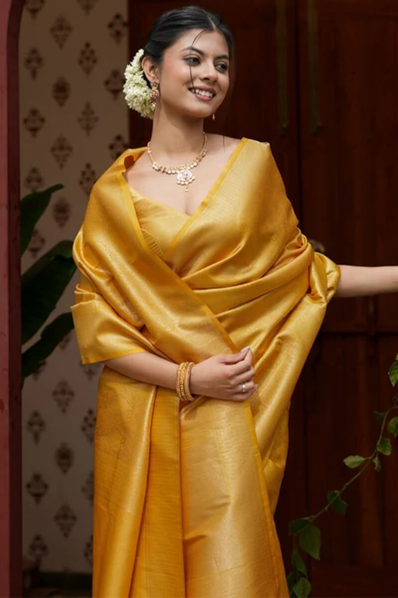 Embrocation Yellow Soft Silk Saree With Aplomb Blouse Piece