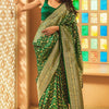 Entrancing Green Soft Silk Saree With Blooming Blouse Piece