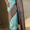 Enigmatic Firozi Soft Silk Saree With Glittering Blouse Piece