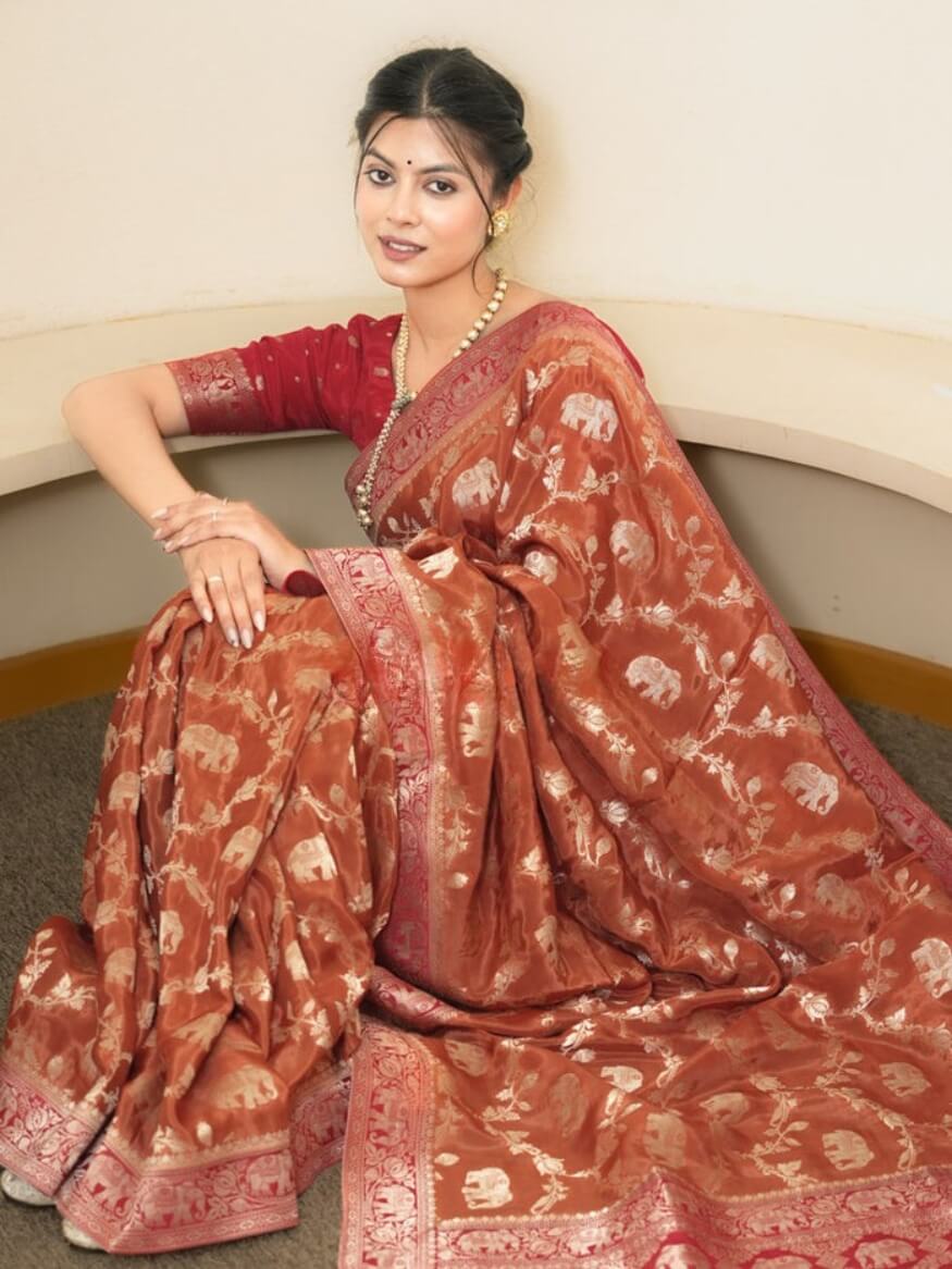 Classy Orange Soft Silk Saree With Piquant Blouse Piece