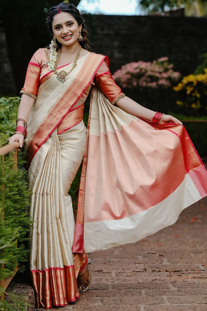 Desultory Beige Soft Silk Saree With Snappy Blouse Piece