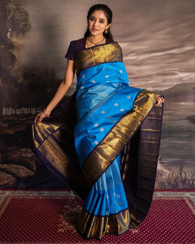 Majestic Firozi Soft Silk Saree With Luminous Blouse Piece