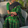 Alluring Dark Green Soft Silk Saree With Entrancing Blouse Piece