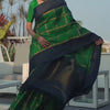 Alluring Dark Green Soft Silk Saree With Entrancing Blouse Piece