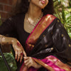 Evocative Black Soft Silk Saree With Brood Blouse Piece