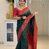Enamoring Dark Green Soft Silk Saree With Jazzy Blouse Piece