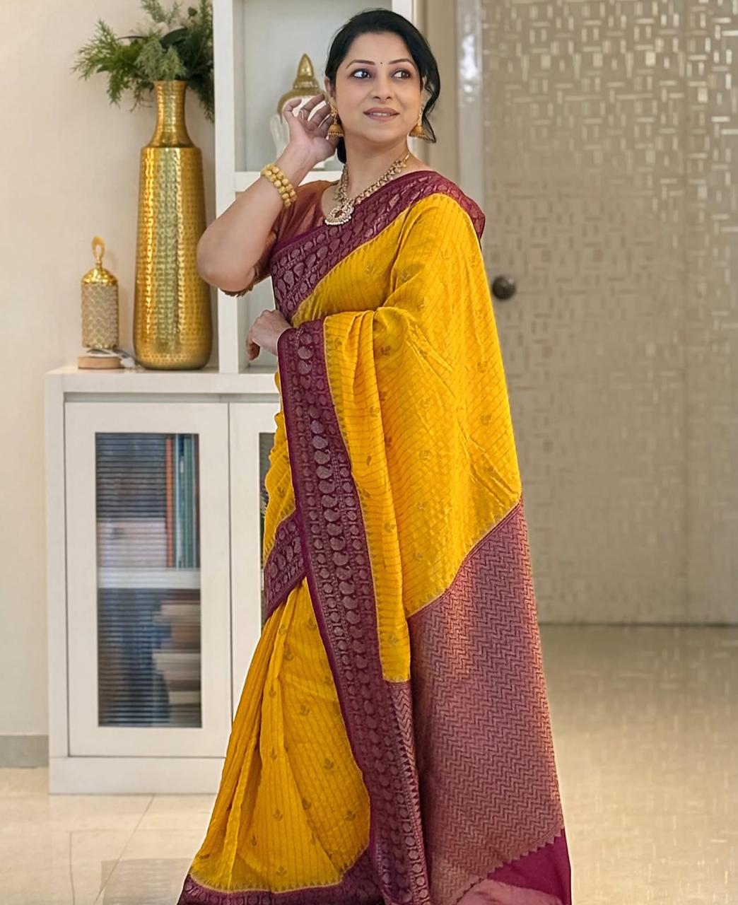 Adorning Yellow Soft Silk Saree With Unique Blouse Piece