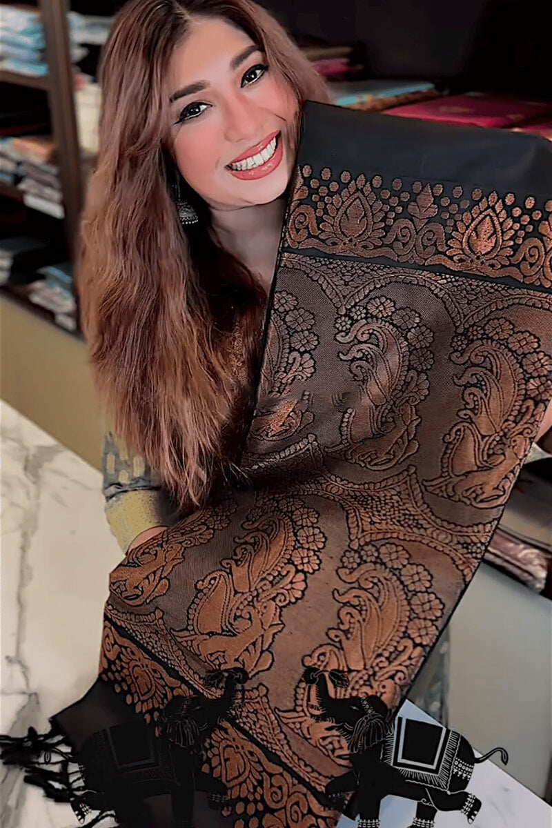 Gratifying Black Soft Banarasi Silk Saree With Intricate Blouse Piece