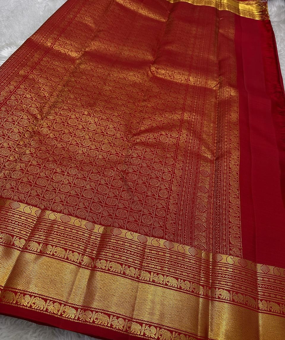 Cynosure Red Soft Banarasi Silk Saree With Marvellous Blouse Piece