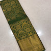 Divine Dark Green Soft Banarasi Silk Saree With Entrancing Blouse Piece