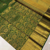 Divine Dark Green Soft Banarasi Silk Saree With Entrancing Blouse Piece