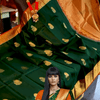 Impressive Dark Green Soft Banarasi Silk Saree With Lovely Blouse Piece