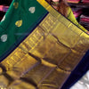 Eloquence Dark Green Soft Banarasi Silk Saree With Ineffable Blouse Piece