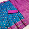 Teal Blue & Royal Purple Woven Silk Saree with Peacock Zari Border and Rich Brocade Pallu