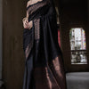 Entrancing Black Soft Silk Saree With Brood Blouse Piece