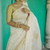 Smart Off White Linen Silk Saree With Hypnotic Blouse Piece