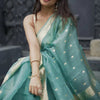 Moiety Turquoise Banarasi Silk Saree With Panoply Blouse Piece