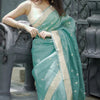 Moiety Turquoise Banarasi Silk Saree With Panoply Blouse Piece