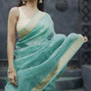 Moiety Turquoise Banarasi Silk Saree With Panoply Blouse Piece