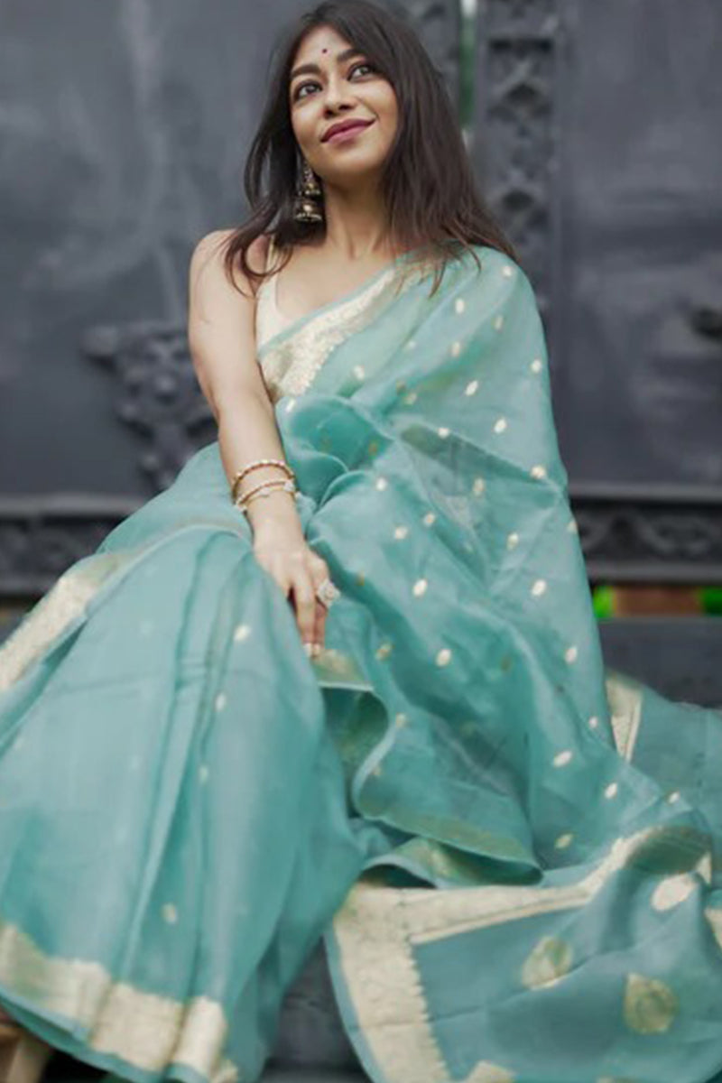 Moiety Turquoise Banarasi Silk Saree With Panoply Blouse Piece