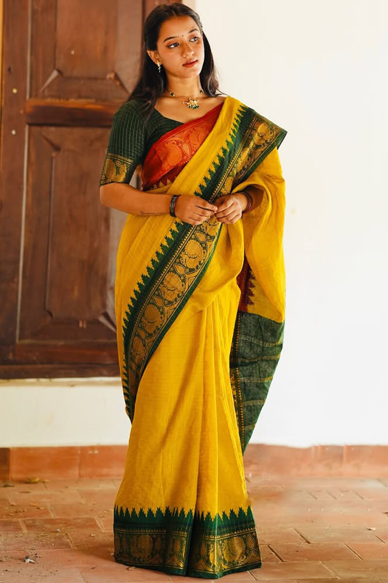Flamboyant Yellow Soft Silk Saree With Ailurophile Blouse Piece