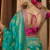 Nectarous Turquoise Banarasi Satin Silk Saree With Glowing Blouse