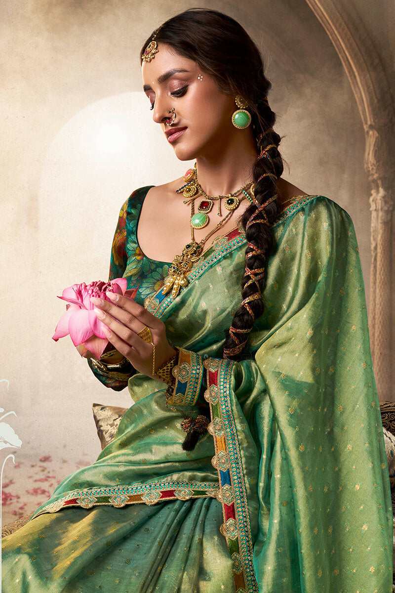 Beleaguer Green Pure Tissue Banarasi Silk Saree With Lustrous Blouse Piece