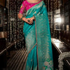 Eclat Sea Green Pure Viscose Dola Silk Saree With Enigmatic Blouse Piece