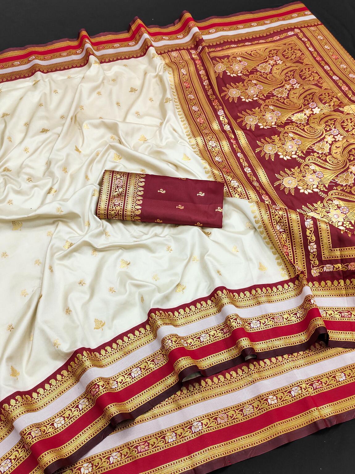 Piquant Off White Soft Banarasi Silk Saree With Quixotic Blouse Piece