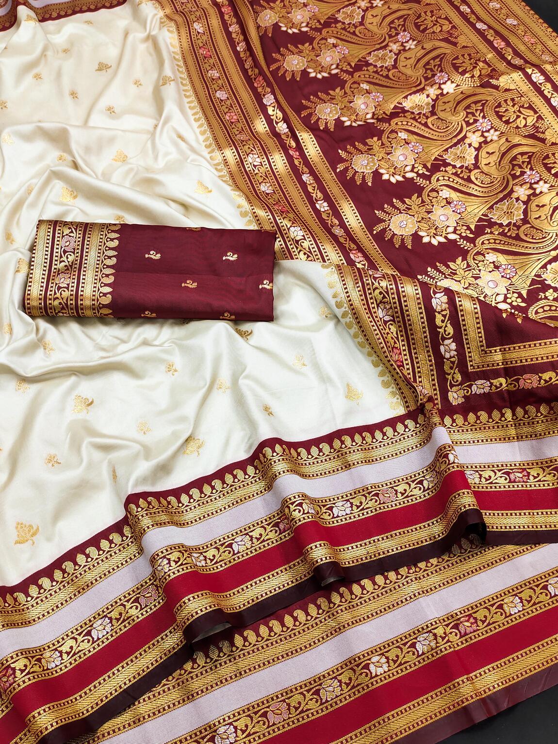 Piquant Off White Soft Banarasi Silk Saree With Quixotic Blouse Piece