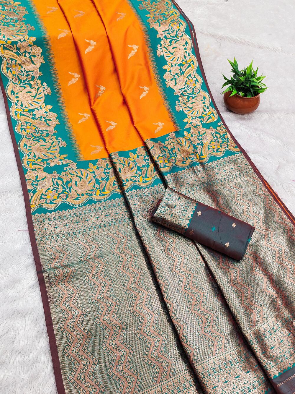 Engaging Orange Soft Banarasi Silk Saree With Hypnotic Blouse Piece