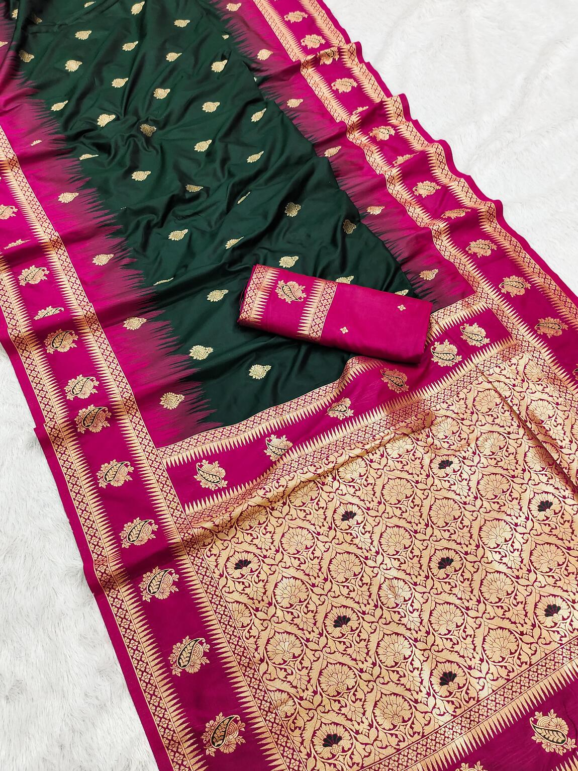 Snazzy Dark Green Soft Banarasi Silk Saree With Diaphanous Blouse Piece