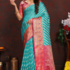 Enticing Firozi Soft Banarasi Silk Saree With Twirling Blouse Piece