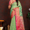 Twirling Pista Soft Banarasi Silk Saree With Traditional Blouse Piece