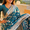Ineffable Teal Blue Soft Banarasi Silk Saree With Zephyr Blouse Piece