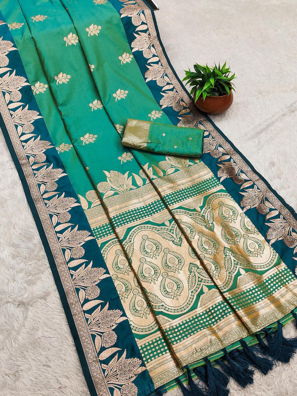 Beguiling Sea Green Soft Banarasi Silk Saree With Ephemeral Blouse Piece
