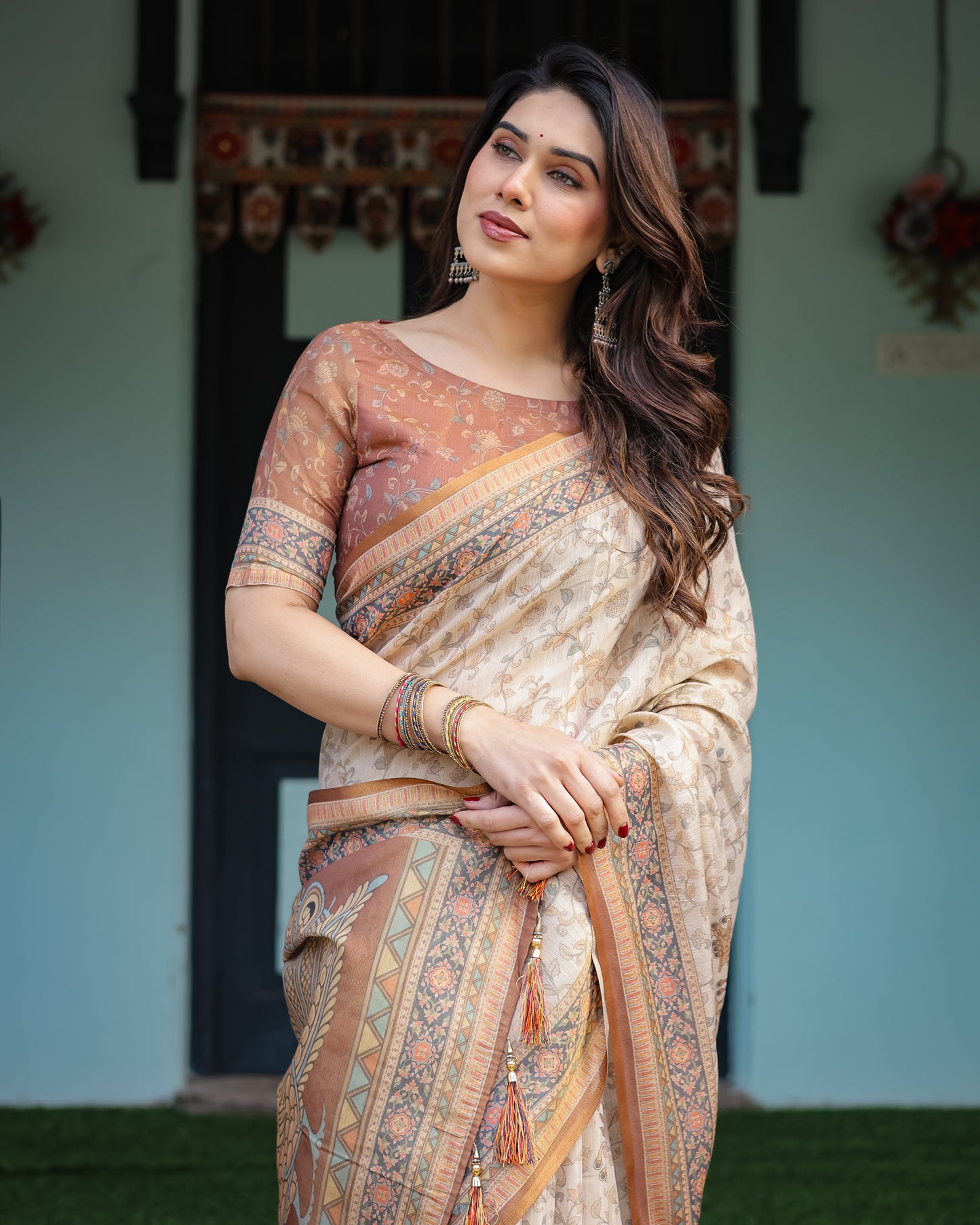 Beige Floral Printed Silk Saree with Contrast Border & Tassel Pallu
