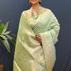 Snazzy Pista Soft Banarasi Silk Saree With Confounding Blouse Piece