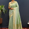 Snazzy Pista Soft Banarasi Silk Saree With Confounding Blouse Piece