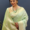 Snazzy Pista Soft Banarasi Silk Saree With Confounding Blouse Piece
