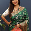 Magnificat Dark Green Patola Silk Saree with Ineffable Blouse Piece