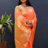 Quintessential Peach Soft Banarasi Silk Saree With Surreptitious Blouse Piece