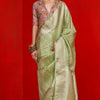Beauteous Green Soft Banarasi Tissue Silk Saree With Susurrous Blouse Piece
