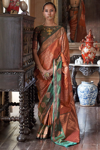 Gossamer Orange Soft Banarasi Silk Saree With Tantalizing Blouse Piece