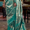 Stunner Turquoise Kanjivaram Silk Saree With Luminous Blouse Piece