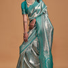Demure Sea Green Kanjivaram Silk Saree With Ornate Blouse Piece